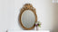 Antique Oval Gilt Mirror with Musical and Floral Fine Details